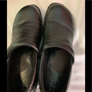 Black leather women’s clogs